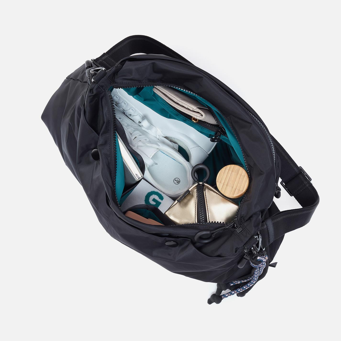THE BIG DRAW Crossbody in CaRefiber recycled nylon – Ocean - HOBO