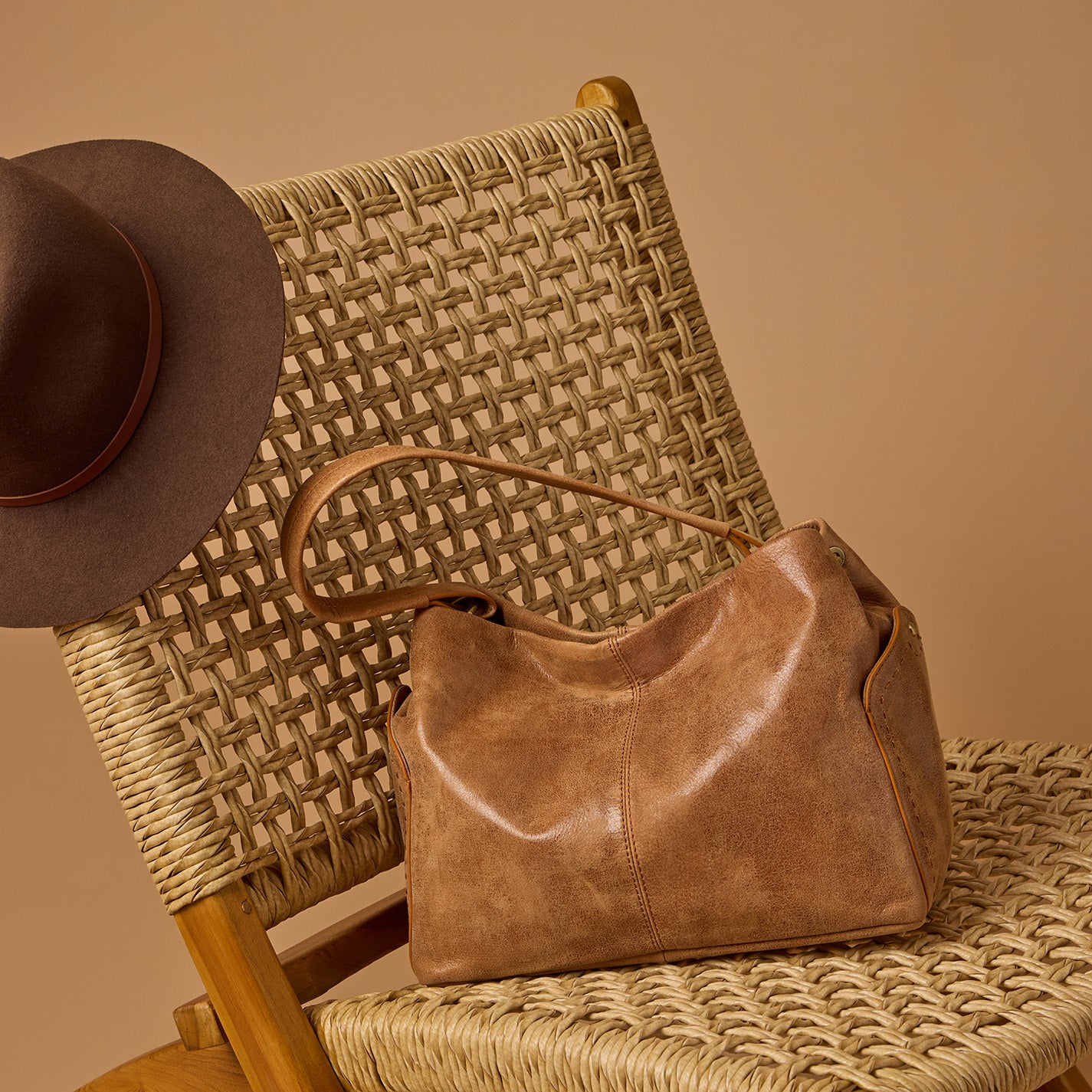 Seneca Shoulder Bag in Buffed Leather – Whiskey - HOBO