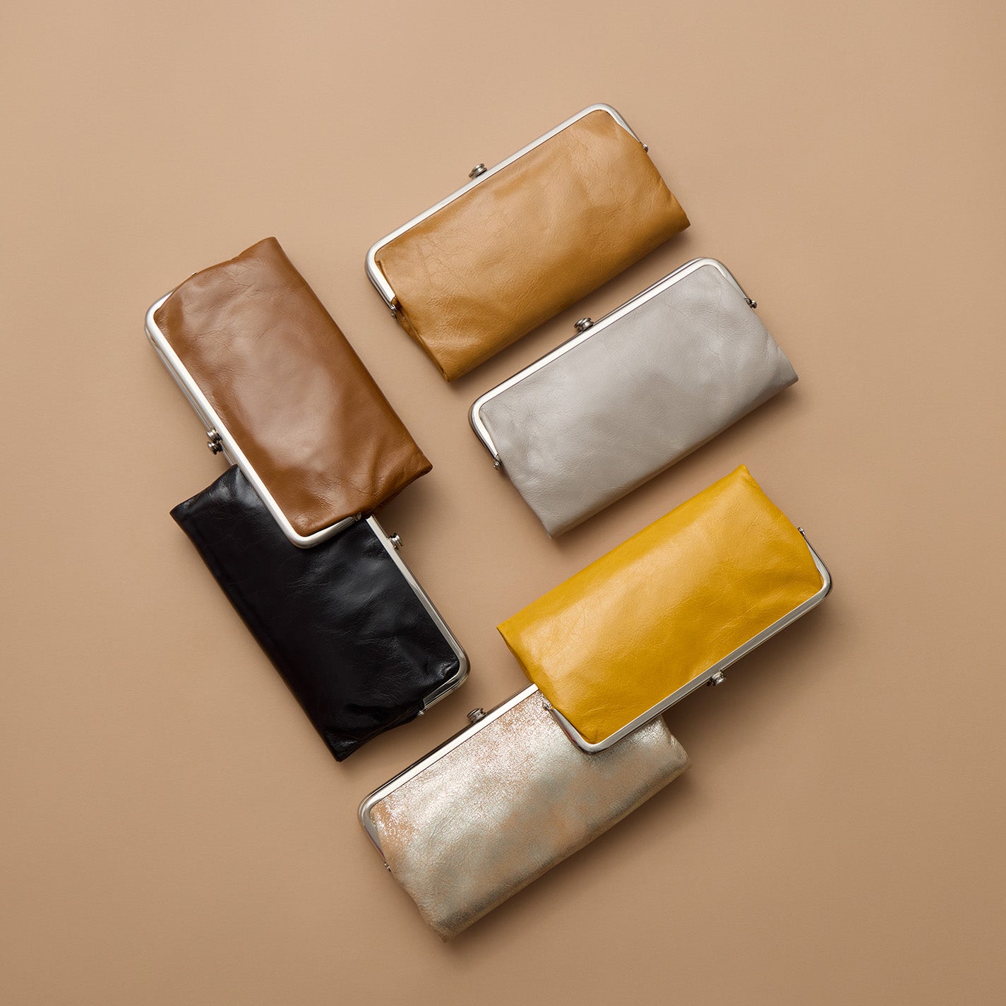 Lauren Clutch-Wallet In Metallic Leather – Saddle Stardust - HOBO