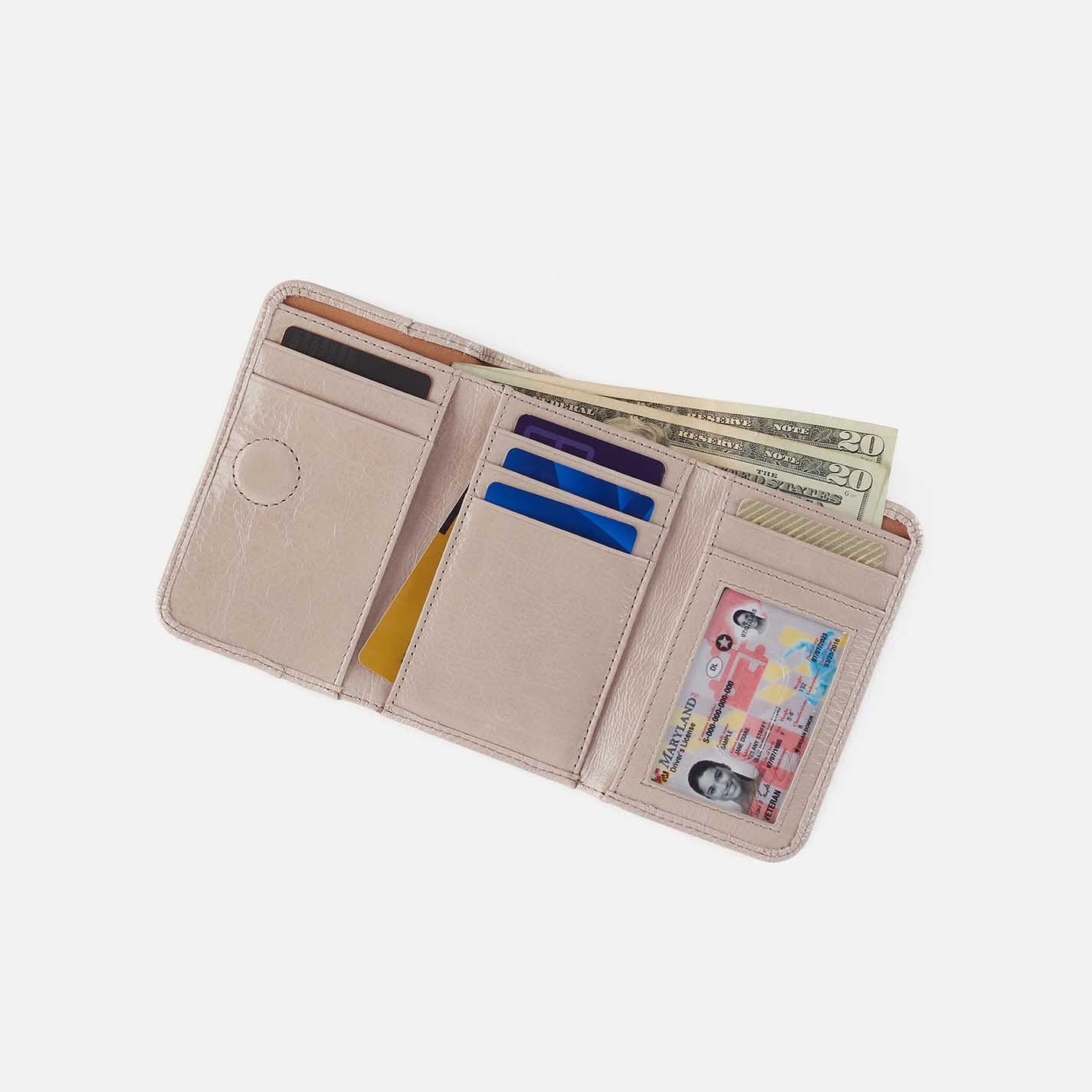 Jill Trifold Wallet in Aniline Gloss Leather – Stone Gloss - HOBO