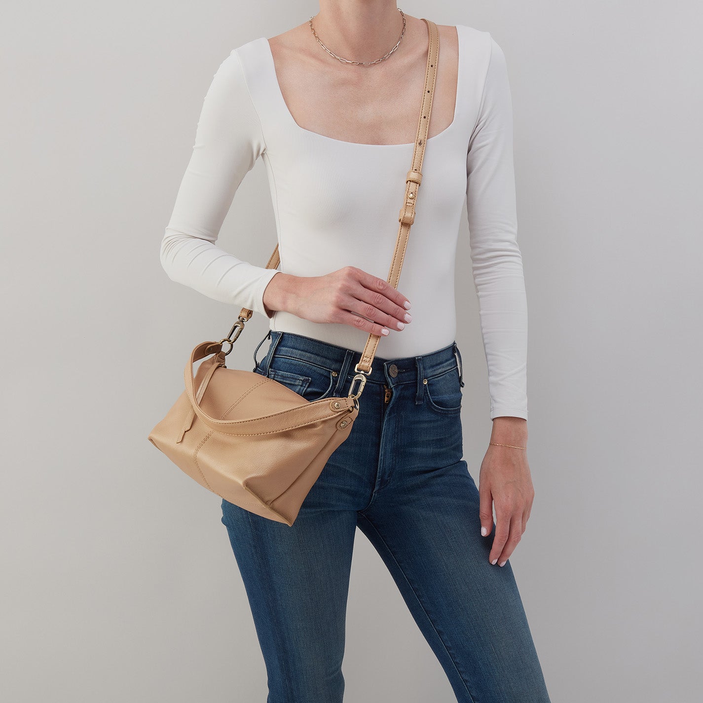 Laguna Crossbody In Metallic Leather – Dusty Gold - HOBO
